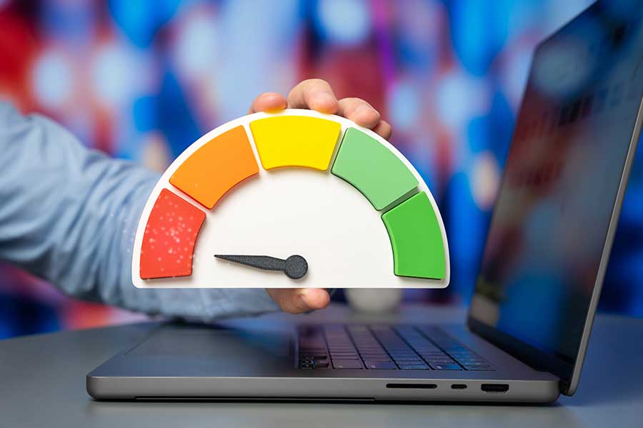 Laptop with meter indicating page load speed