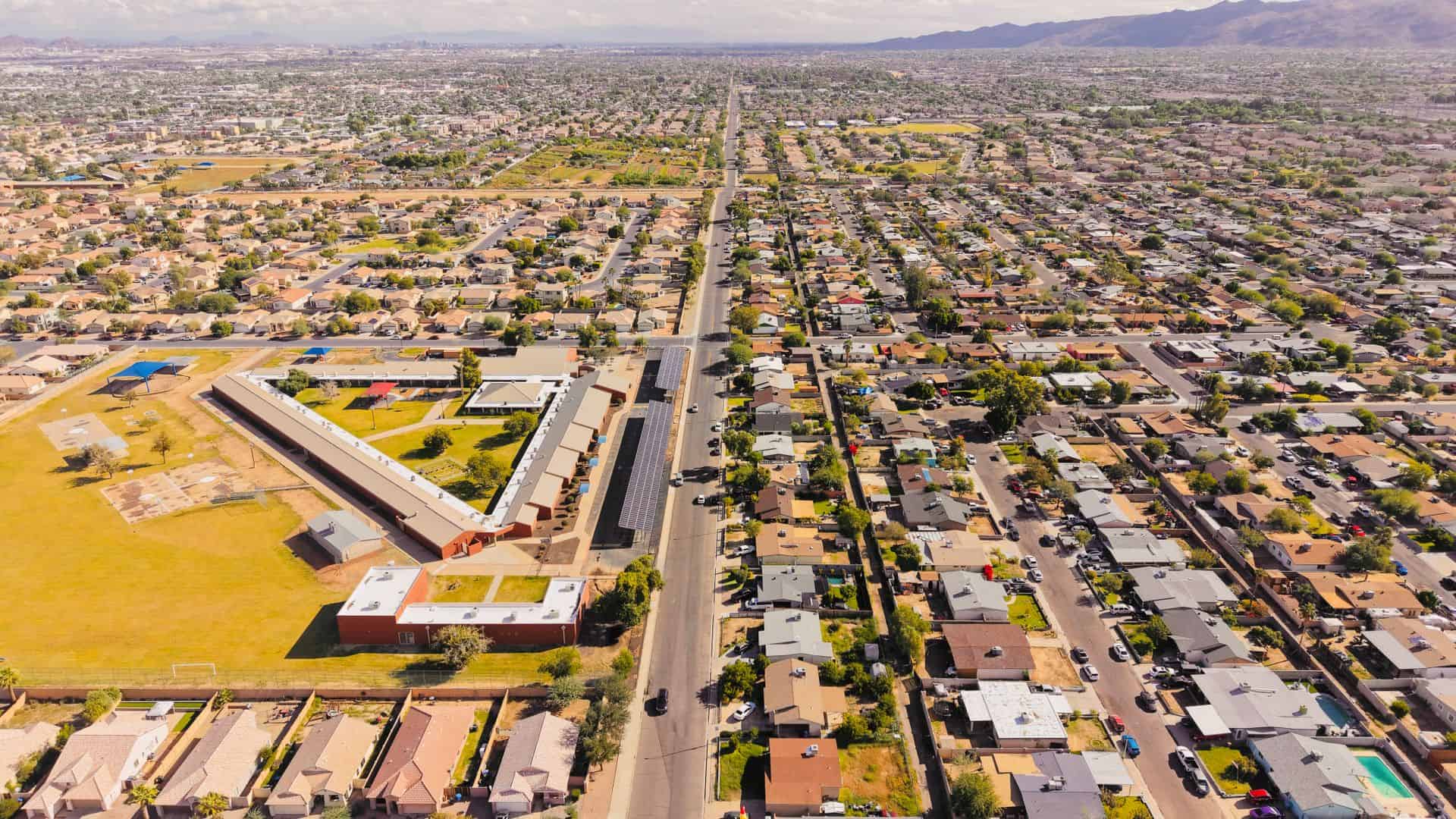 Las Vegas residential neighborhood in fall light with desert mountains behind
