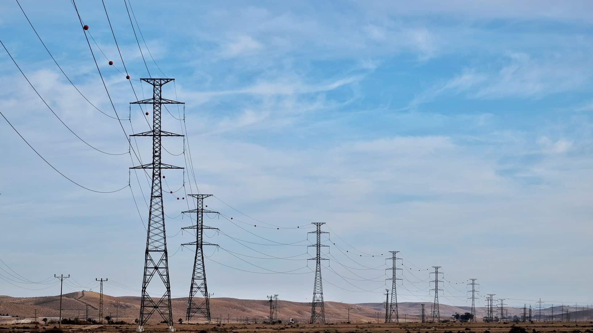 Electric utility lines serving Las Vegas rental homes at sunset