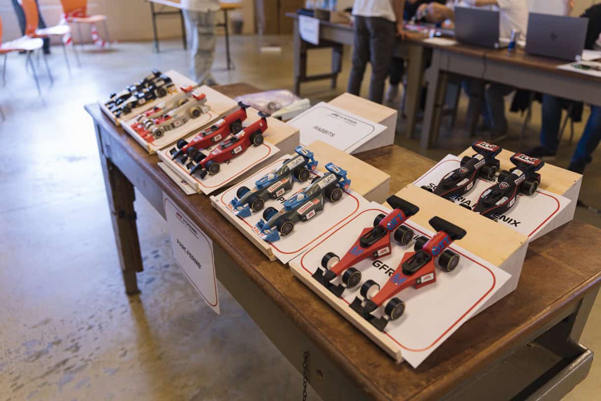 A table with several model cars on it