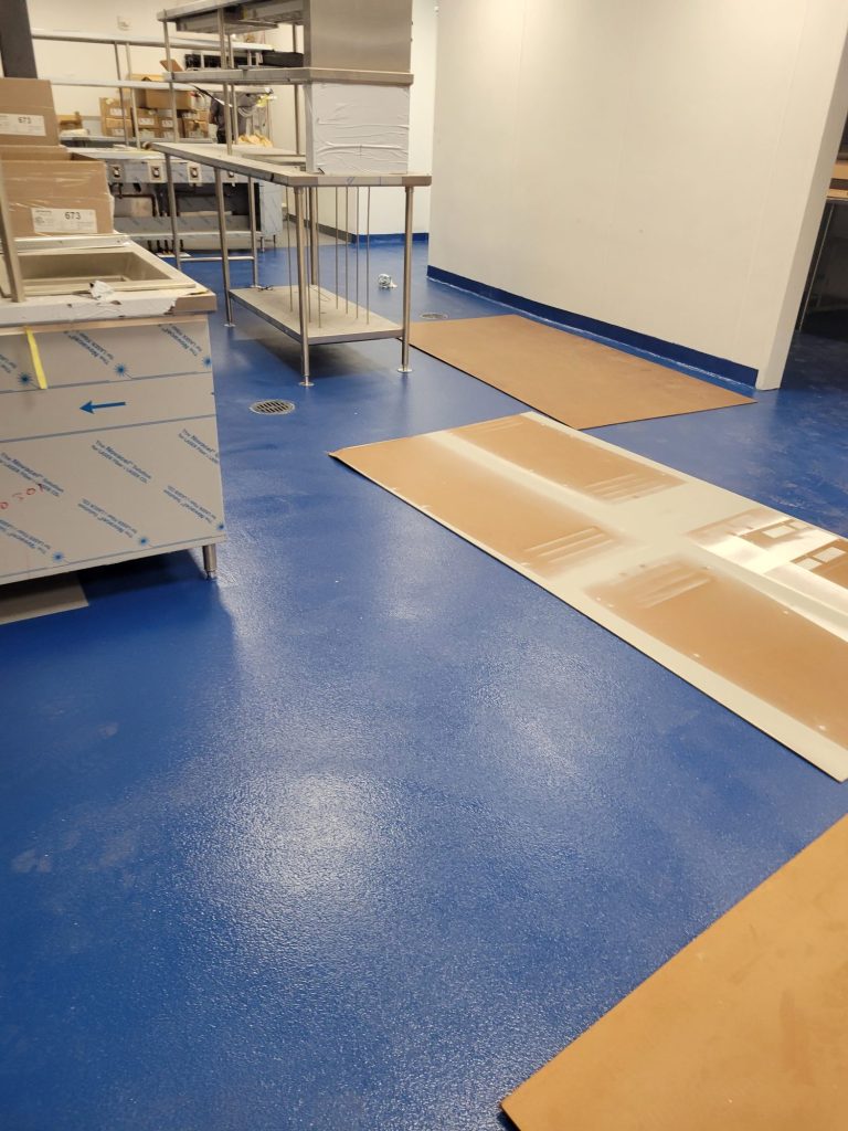 garage-floor-coating-palm-beach-county-jc-elite Commercial epoxy flooring: blue epoxy floor in a commercial kitchen