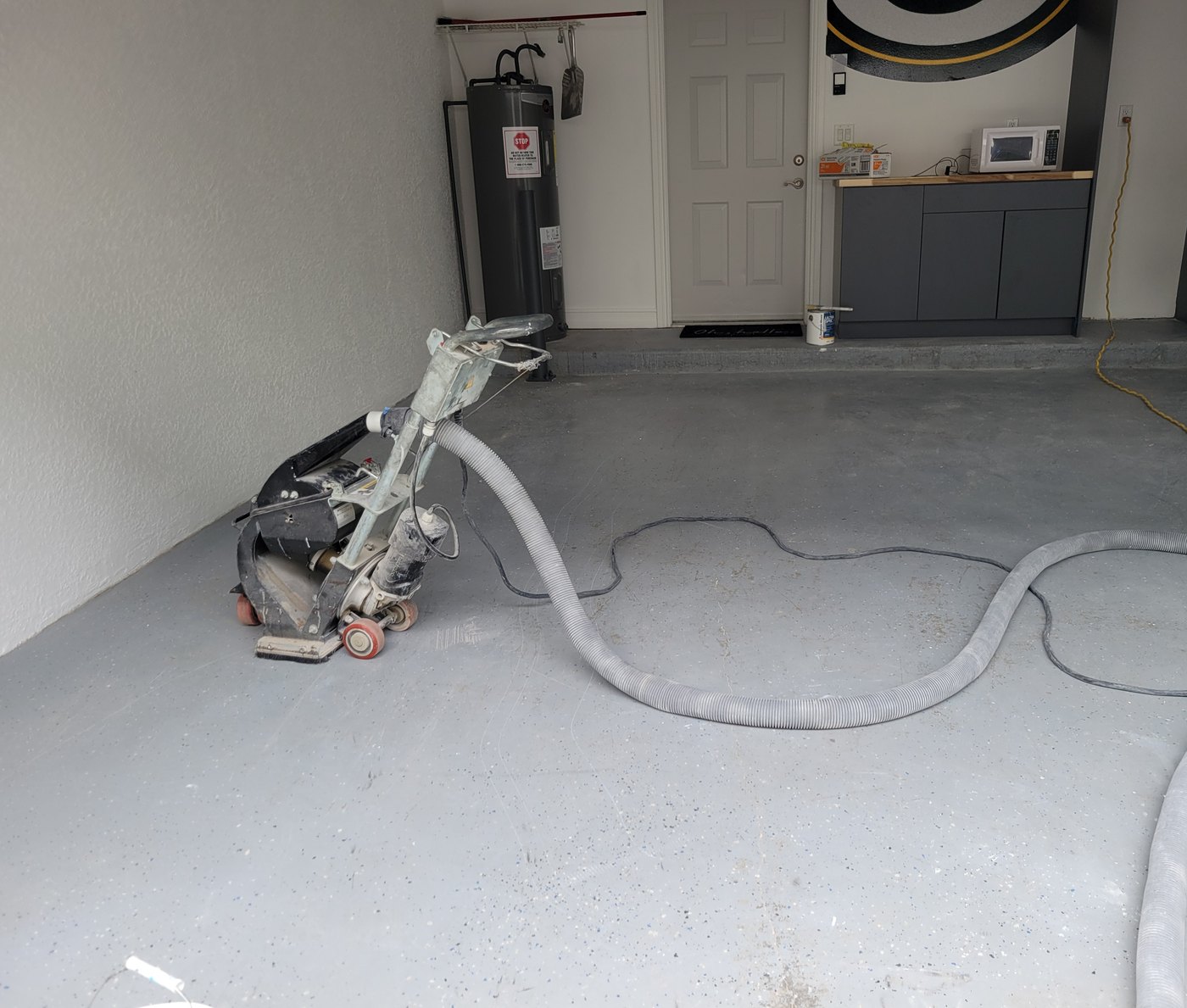 Grinding a garage slab before an epoxy coating