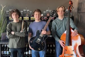 Jazz band musicians with guitar and double bass at Madison Jazz Society event, promoting live jazz performances and jazz education in Madison.