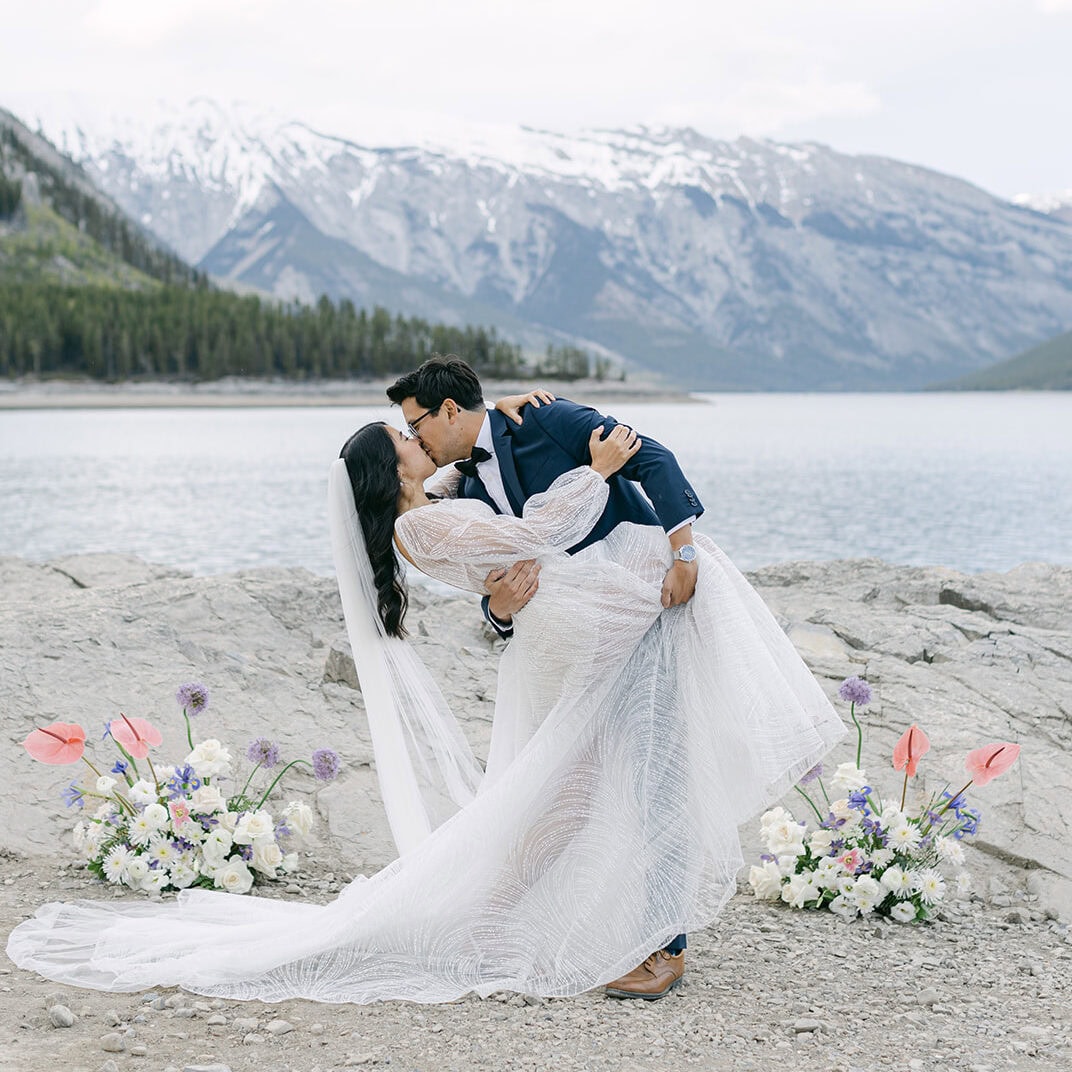 Banff wedding photographer capturing a couple during a mountain ceremony in Banff National Park
