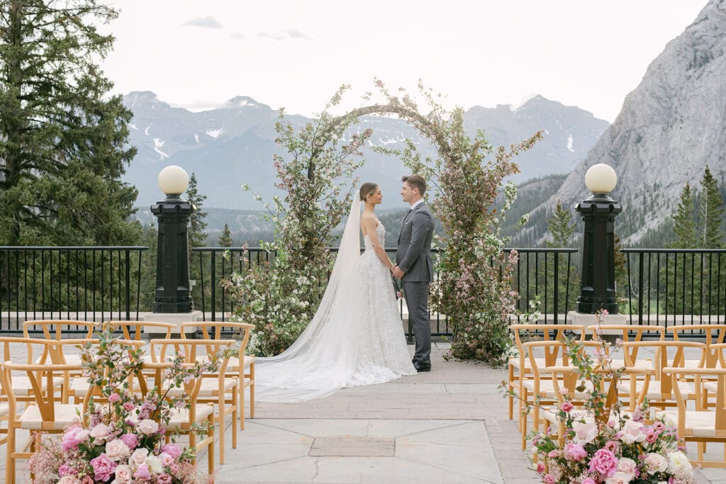 Fairmont Banff Springs wedding ceremony on terrace overlooking the Bow Valley