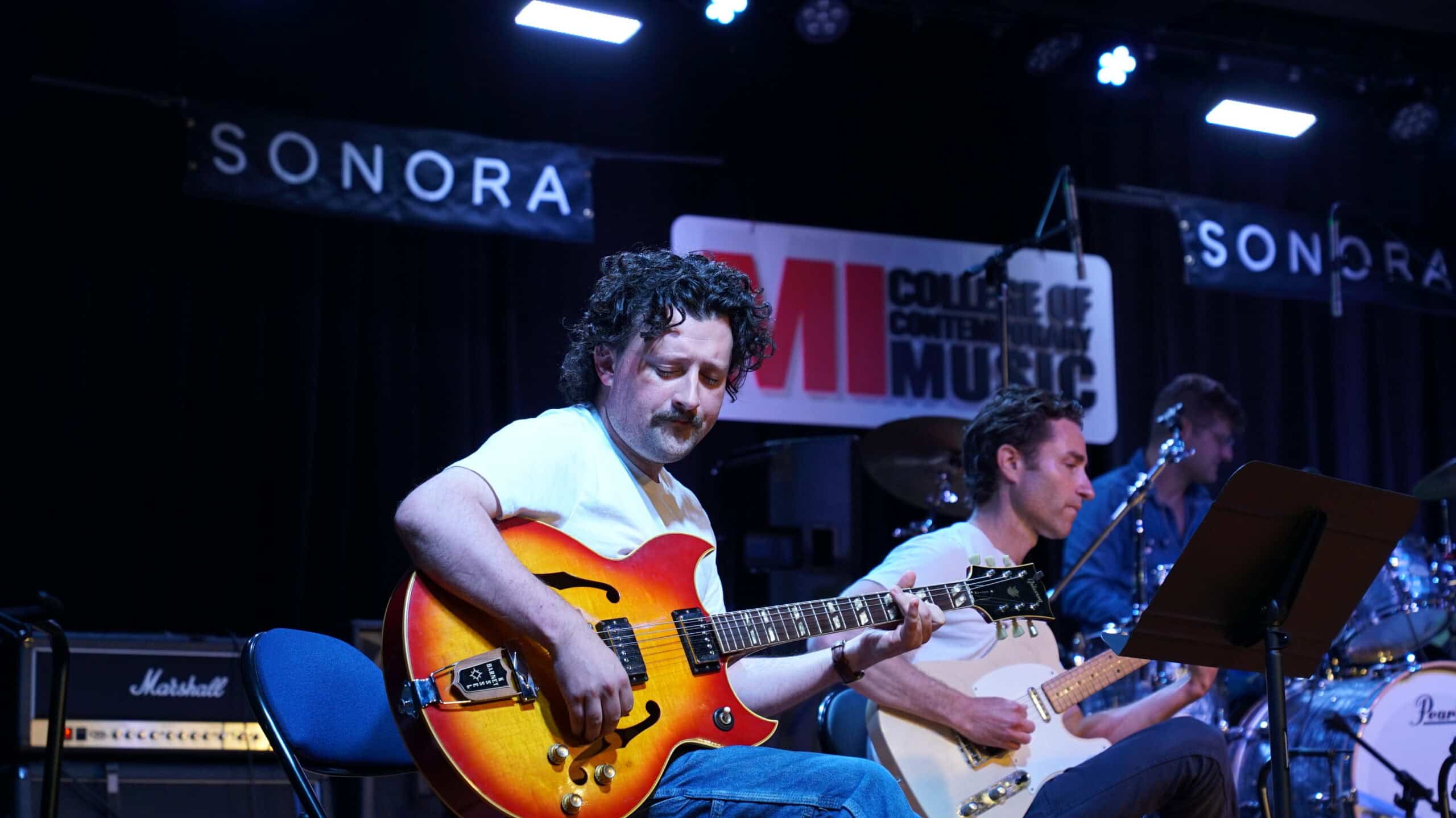 Guitarists performing together during the Sonora LA Retreat at Musicians Institute