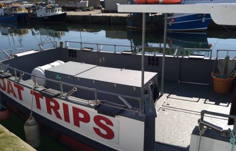Fishing boat at Moray Firth marina for fishing trips and charters.