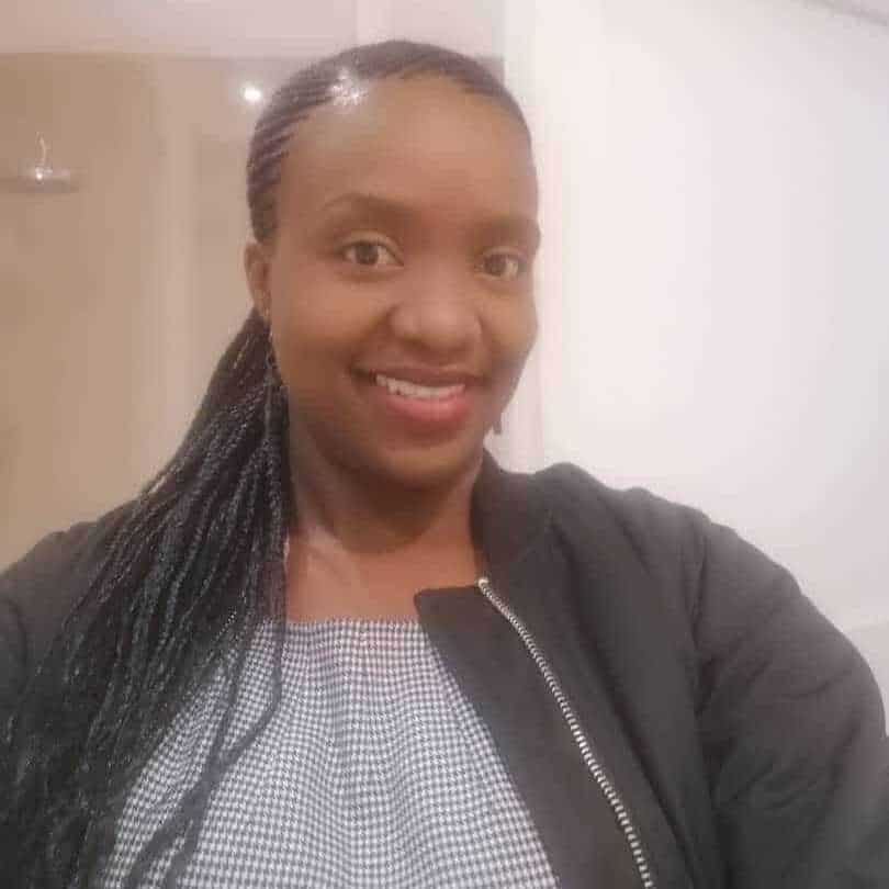 Kabwe Musonda smiling at NLW International event.