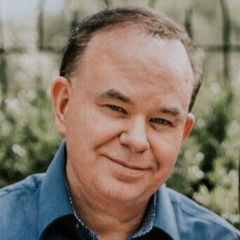 Phil Waldrep smiling at NLW International event.