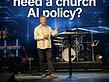 Speaker on stage discussing church AI policy with digital background.