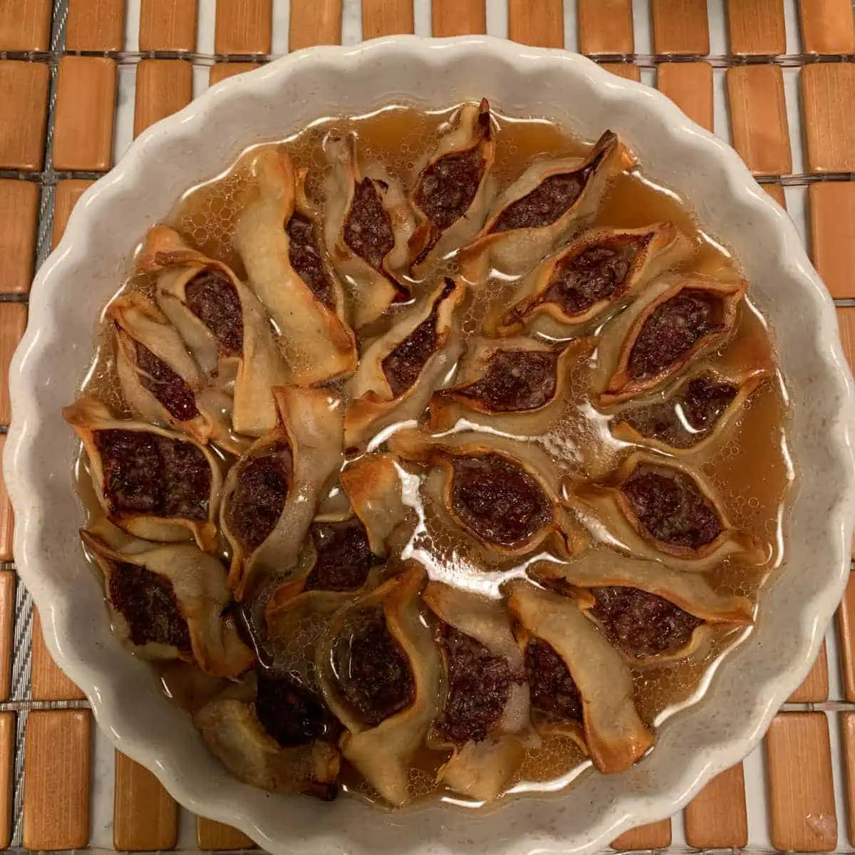 Manti in a baking dish.