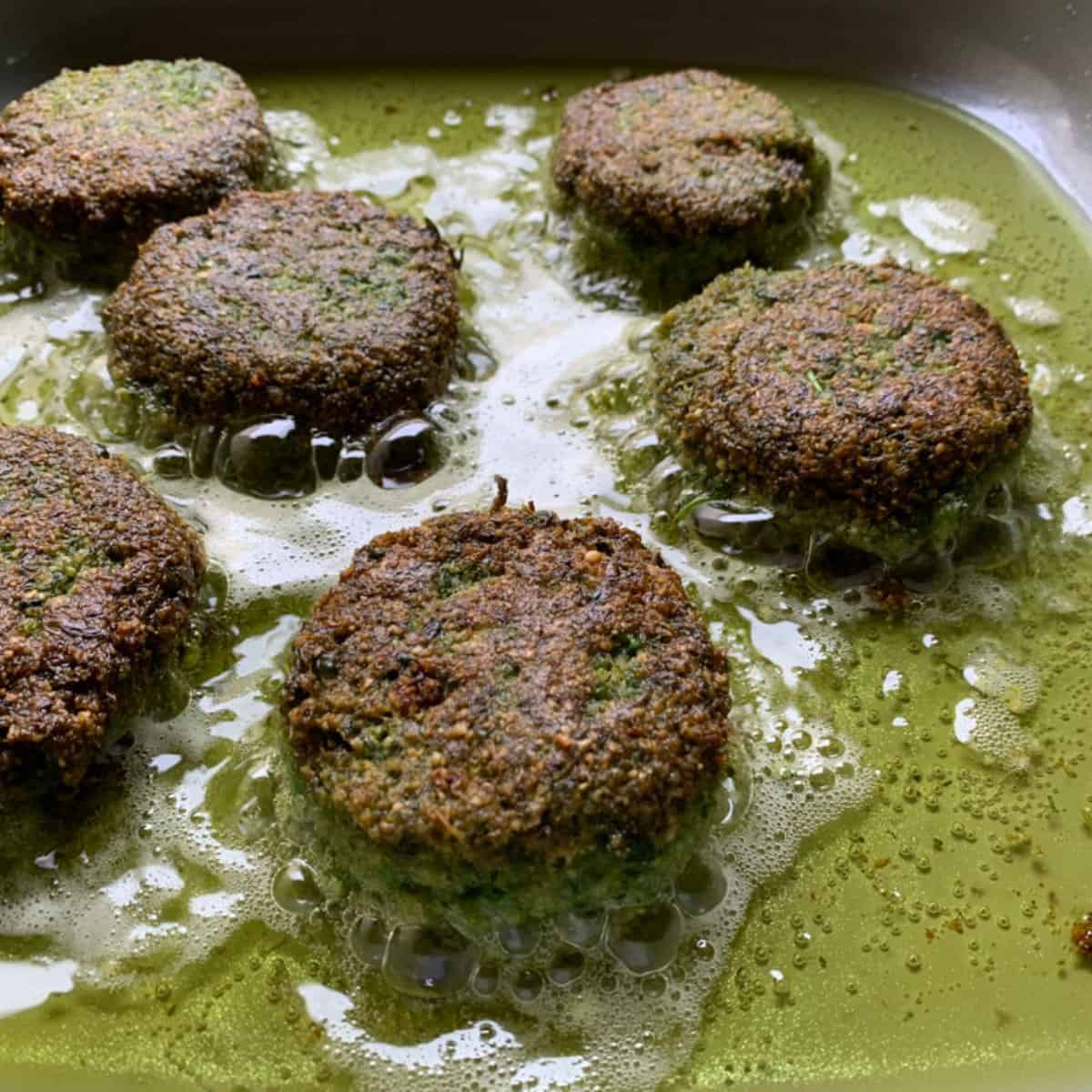 Falafel frying in a oil.