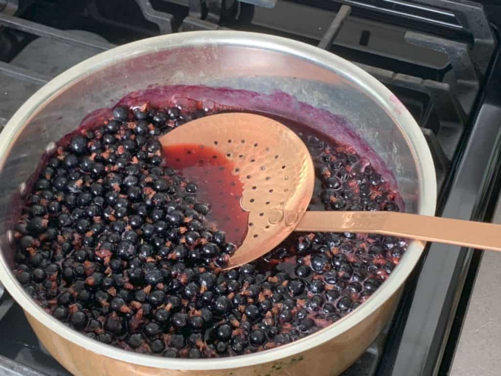 Blackcurrant berries releasing juice.