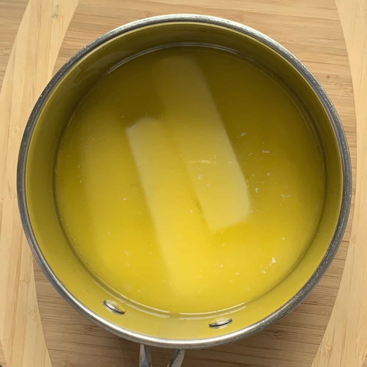 Butter melting in a sauce pan.