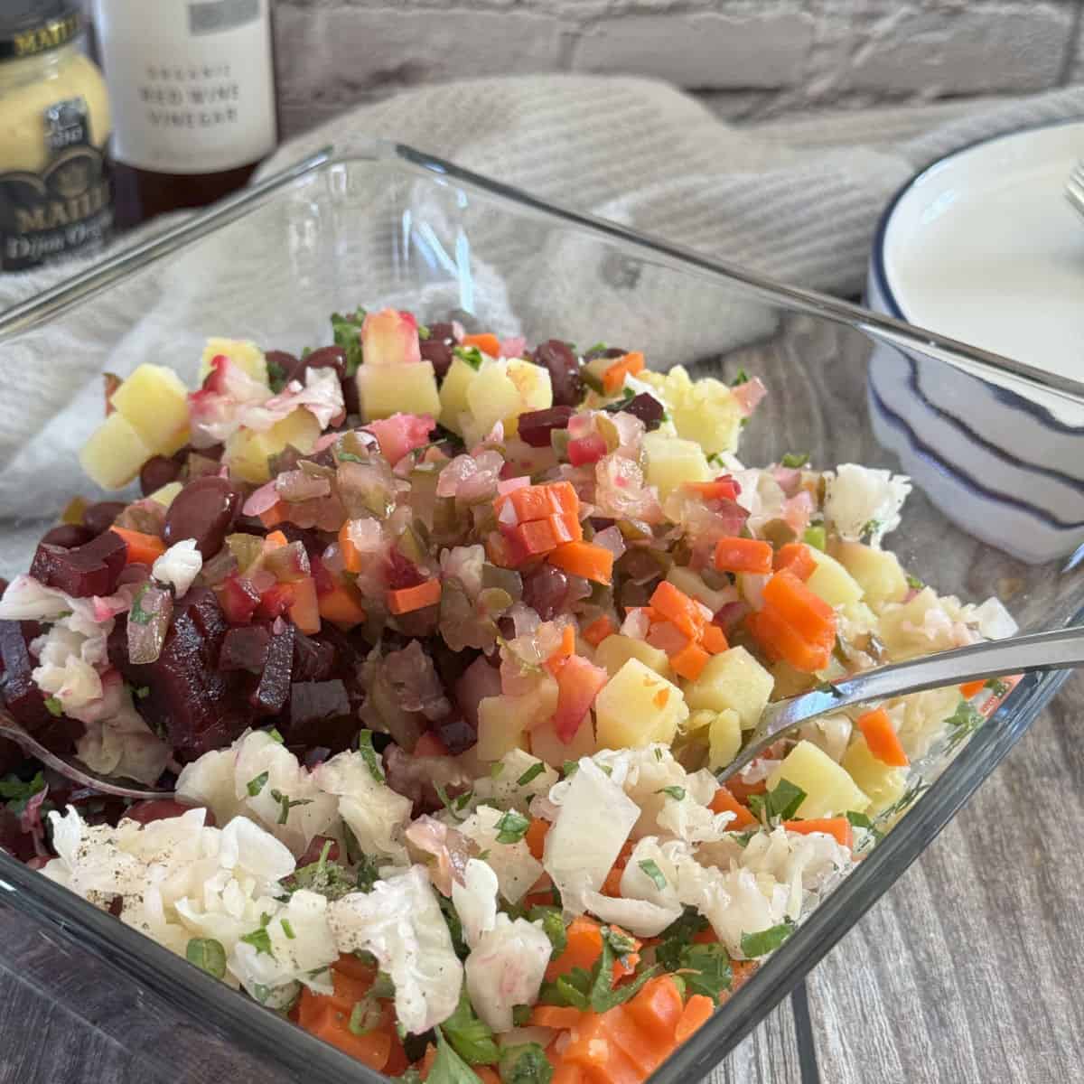 Mixing the salad.