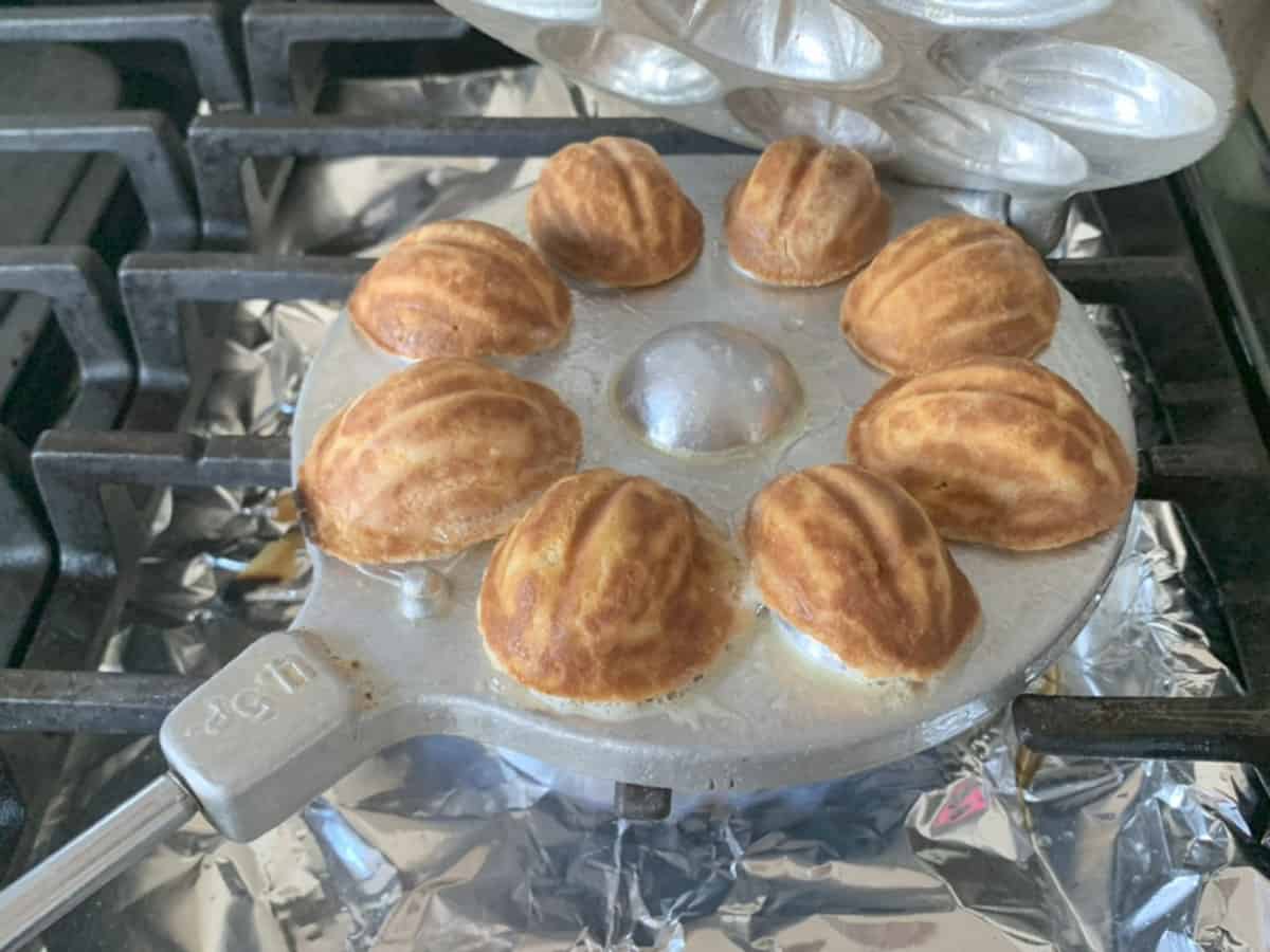 Waffle make opened showing popoque shells.