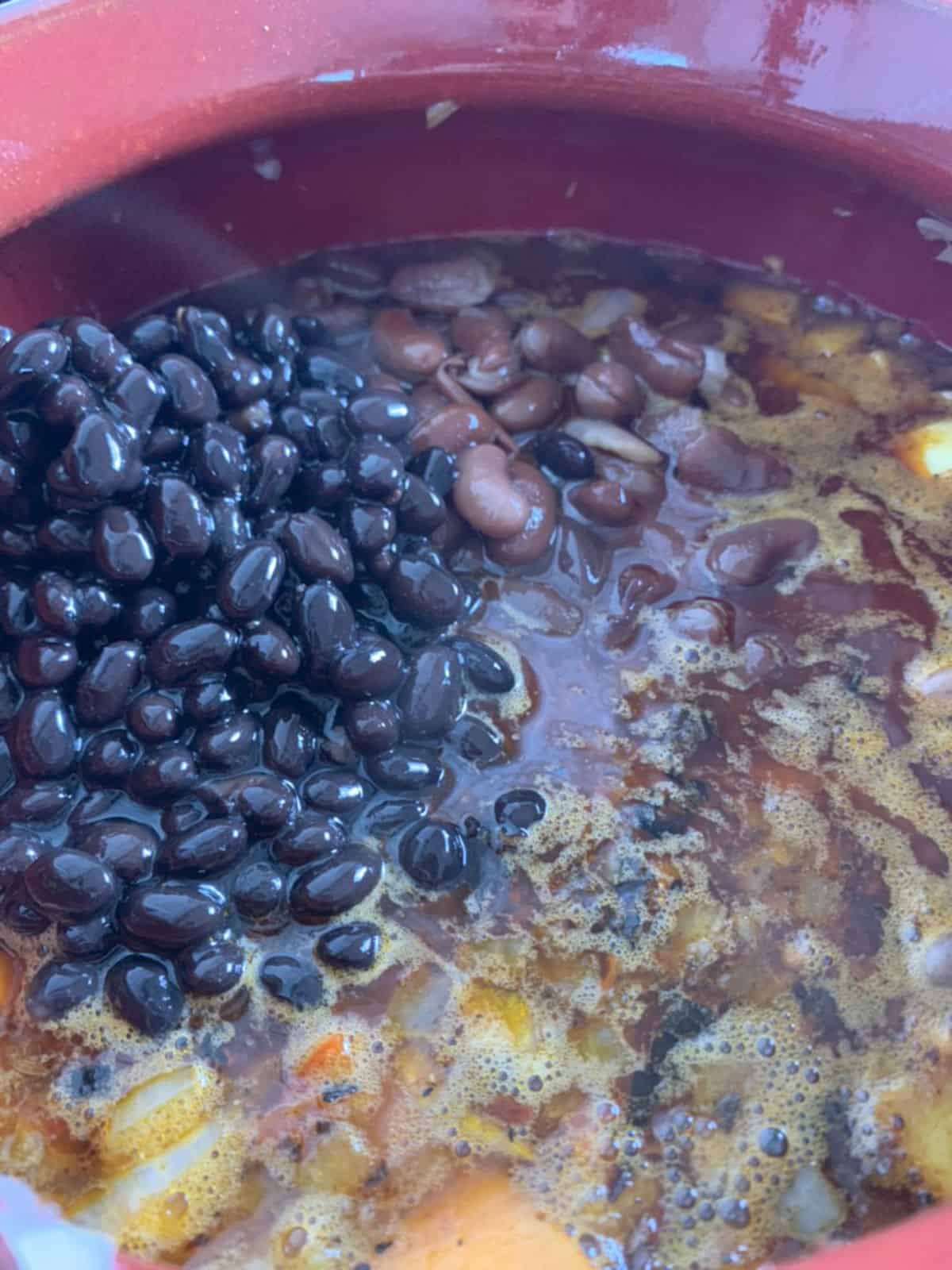 Three bean chili step-by-step adding beans. Three bean chili step-by-step adding beans.