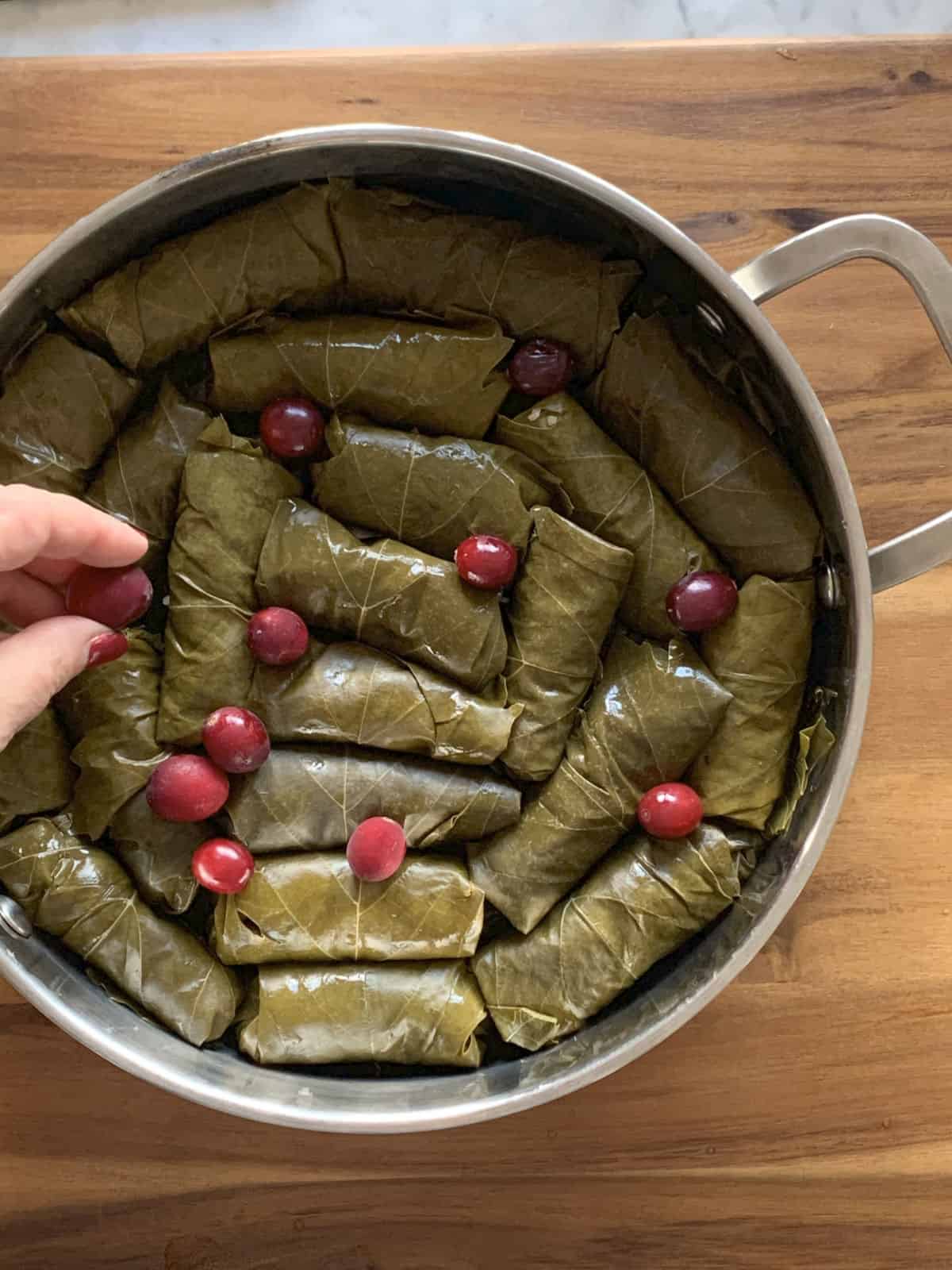 Tolma arranged in a cooking pan.