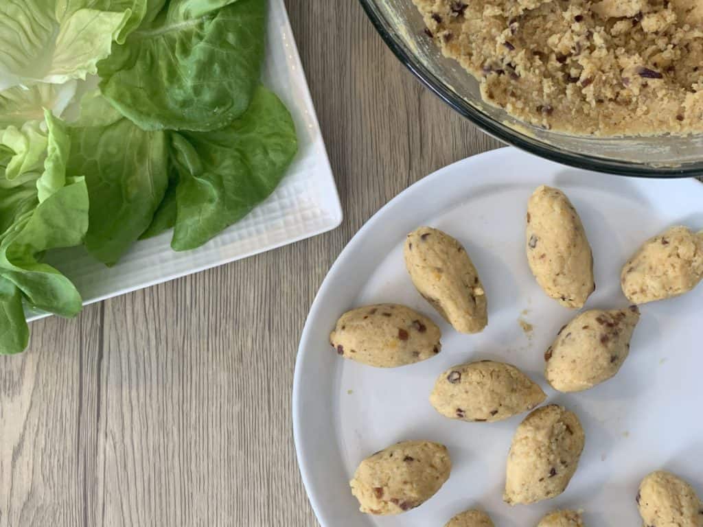 Forming the red lentil koftas.