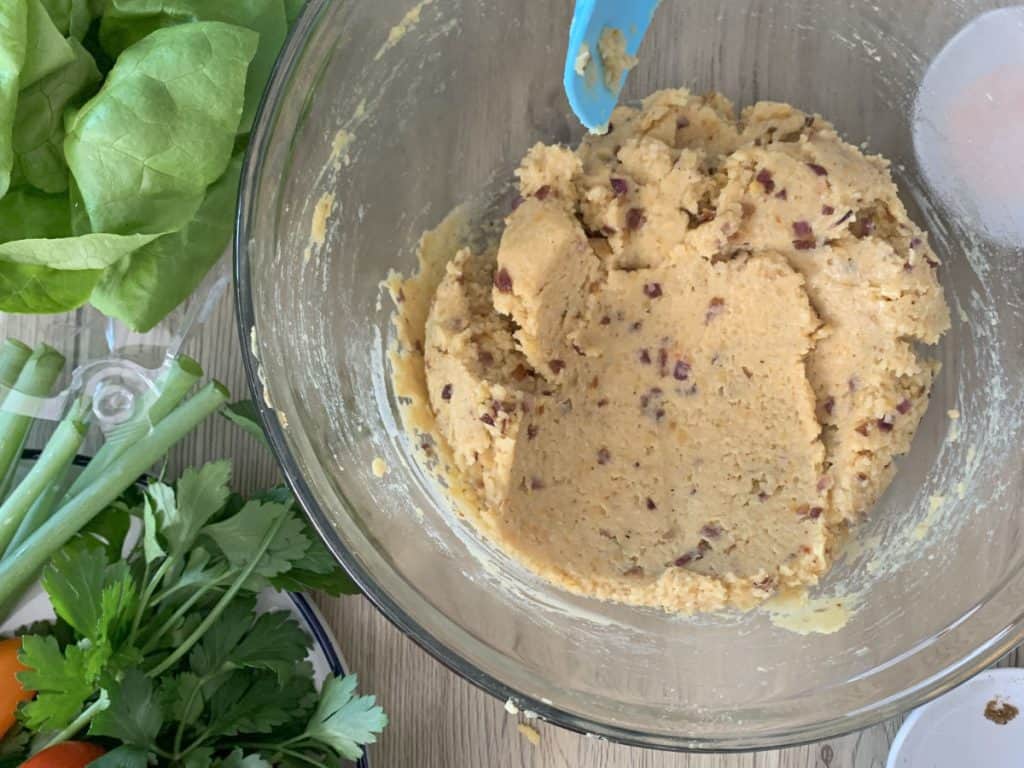 Kneading the lentil mixture.
