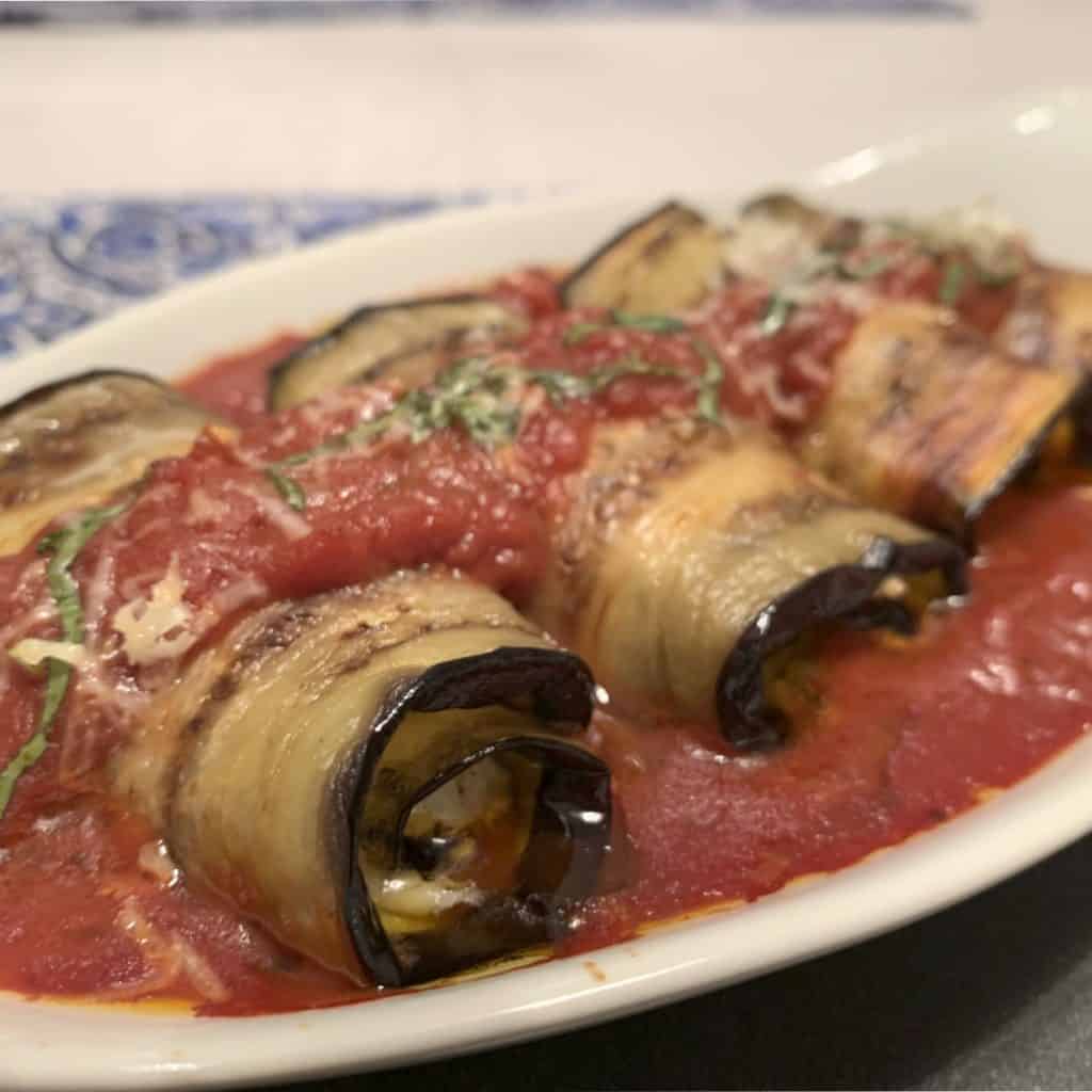 Involtini di Melanzane in an individual baking dish.