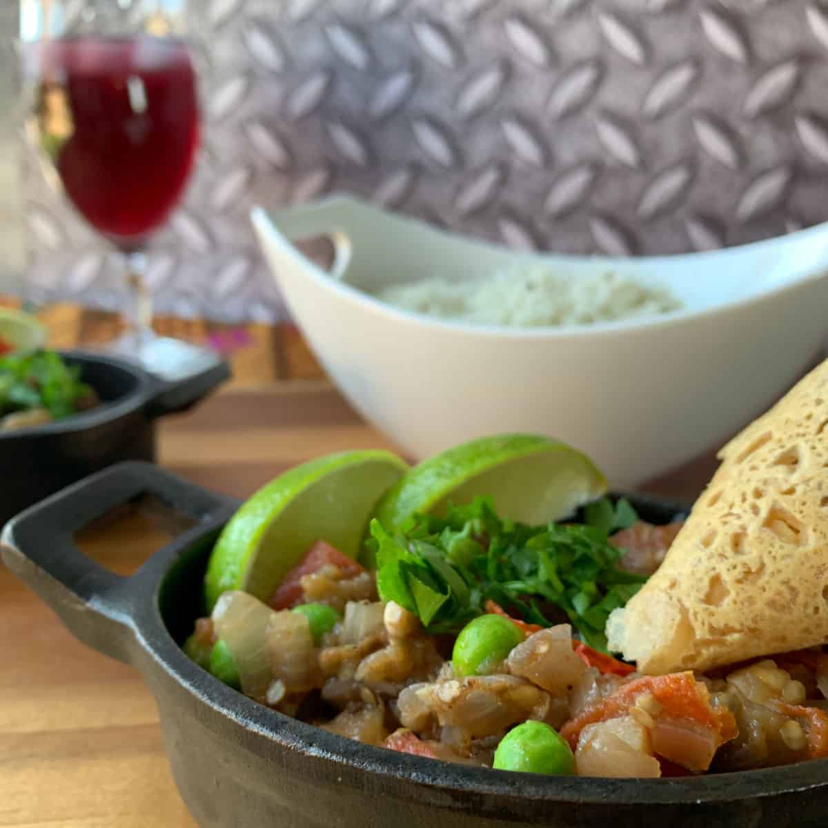 Eggplant bharta with rice and chickpea crepe.