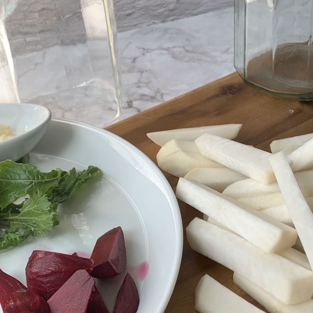 Turnips are ready on a cutting board.