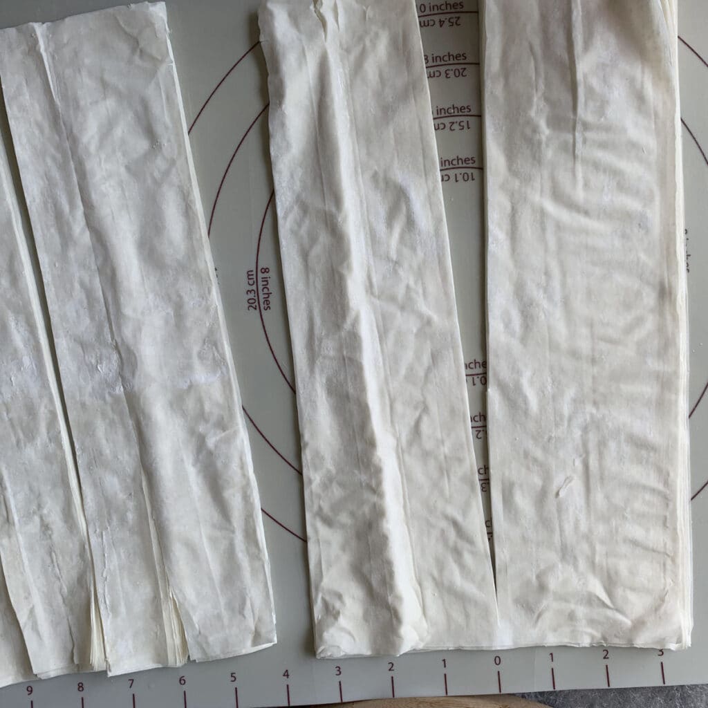 Phyllo sheets cut into strips.