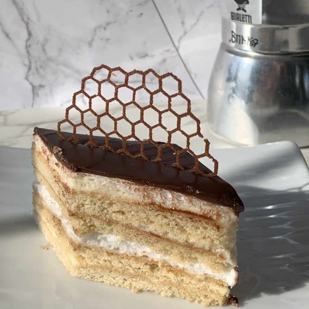 Slice of birds milk cake.