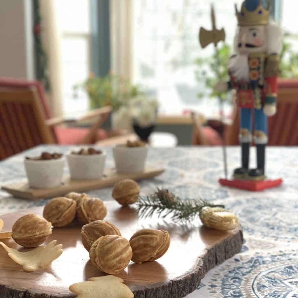 Walnut cookie on a boar and a Christmas nutcrackers.