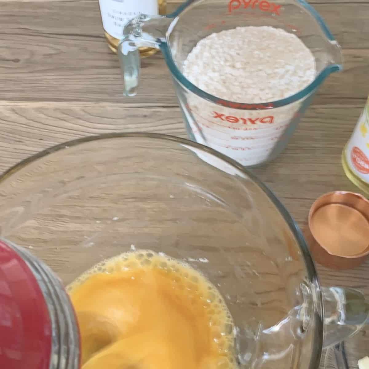 Whipping the eggs and sugar.