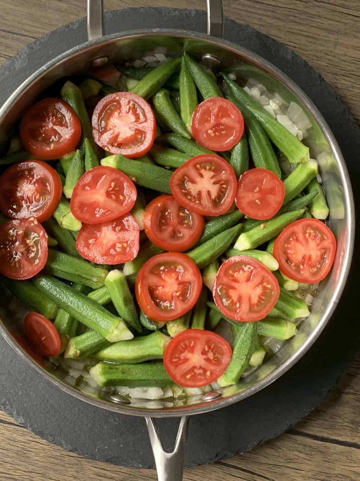 Tomatoes added to the pan.