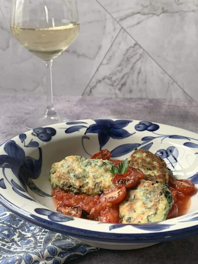 Ricotta Kale gnocchi on a plate.
