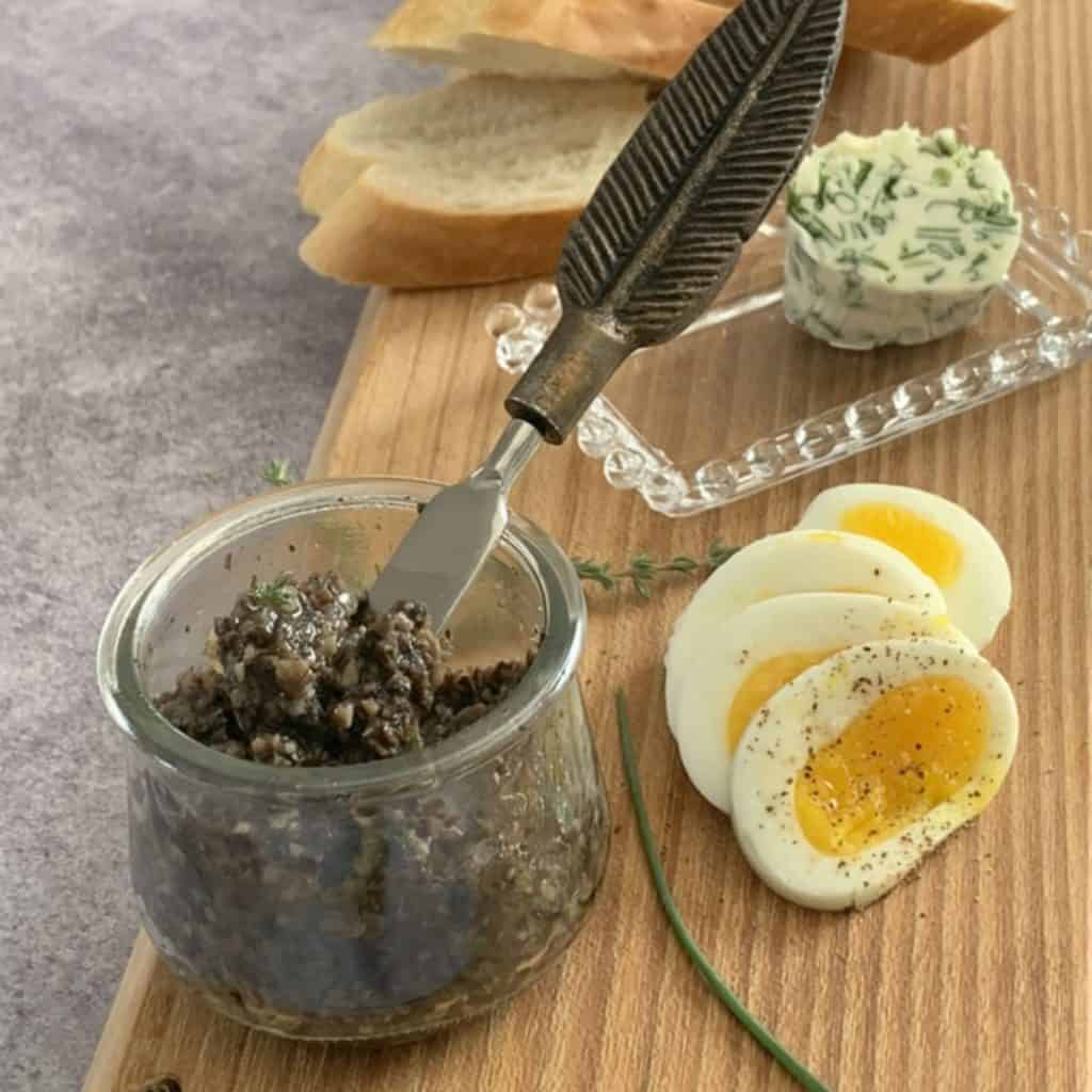 Mushroom Pate with eggs and compound butter.