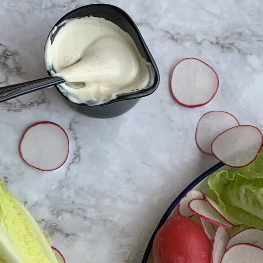 Overhead shot of the sour cream dressing.
