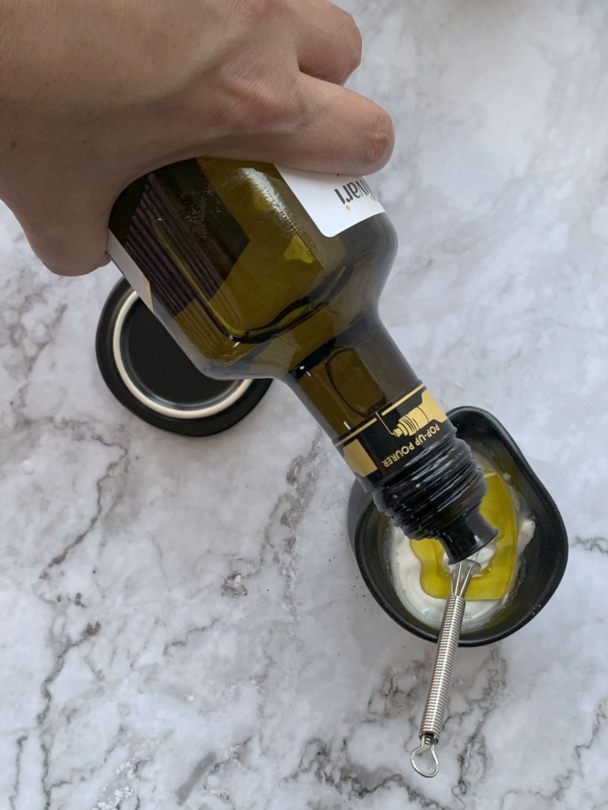 Adding oil to sour cream