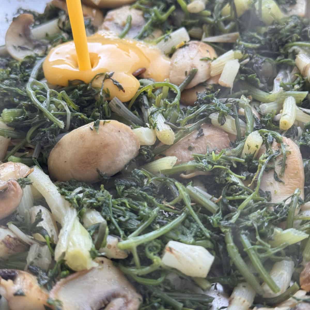 A close up of pouring eggs.
