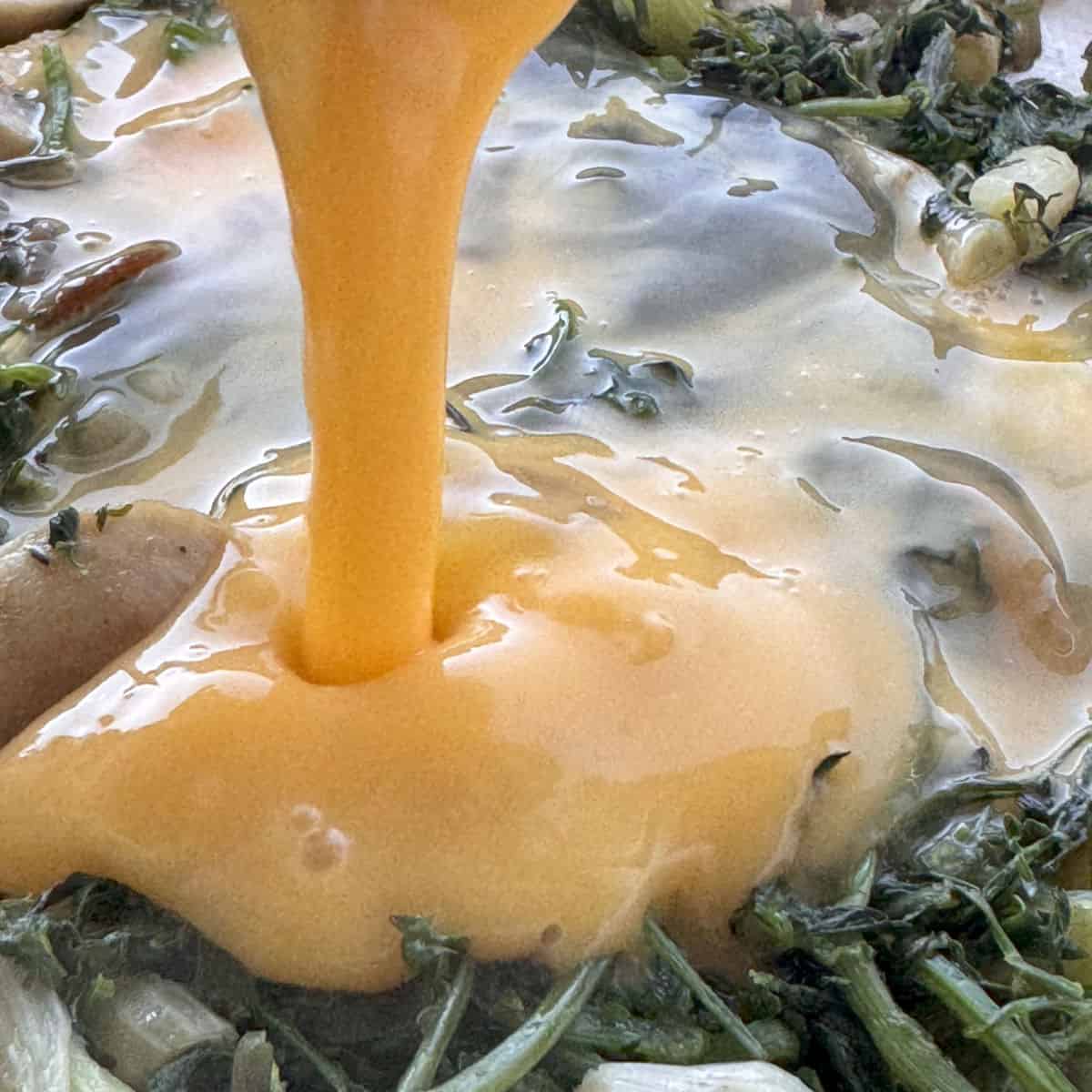 A close up of pouring eggs.