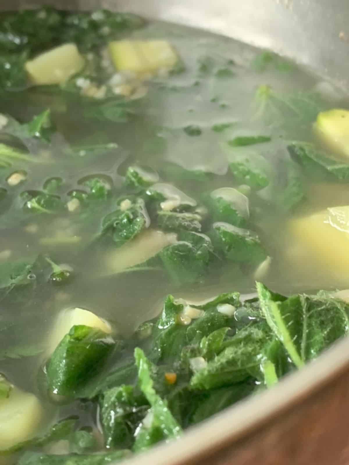 Cooking the nettle soup.