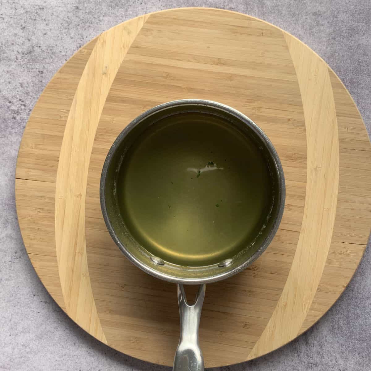 Cooked syrup in a sauce pan.
