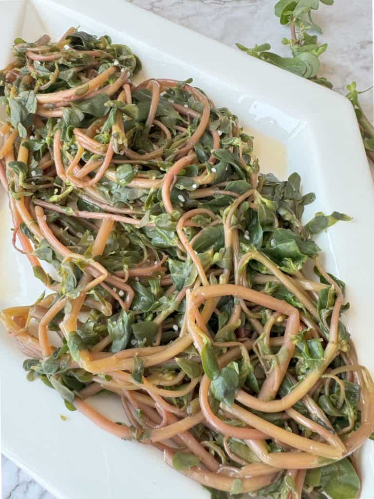 Overhead shot of the wilted purslane salad.