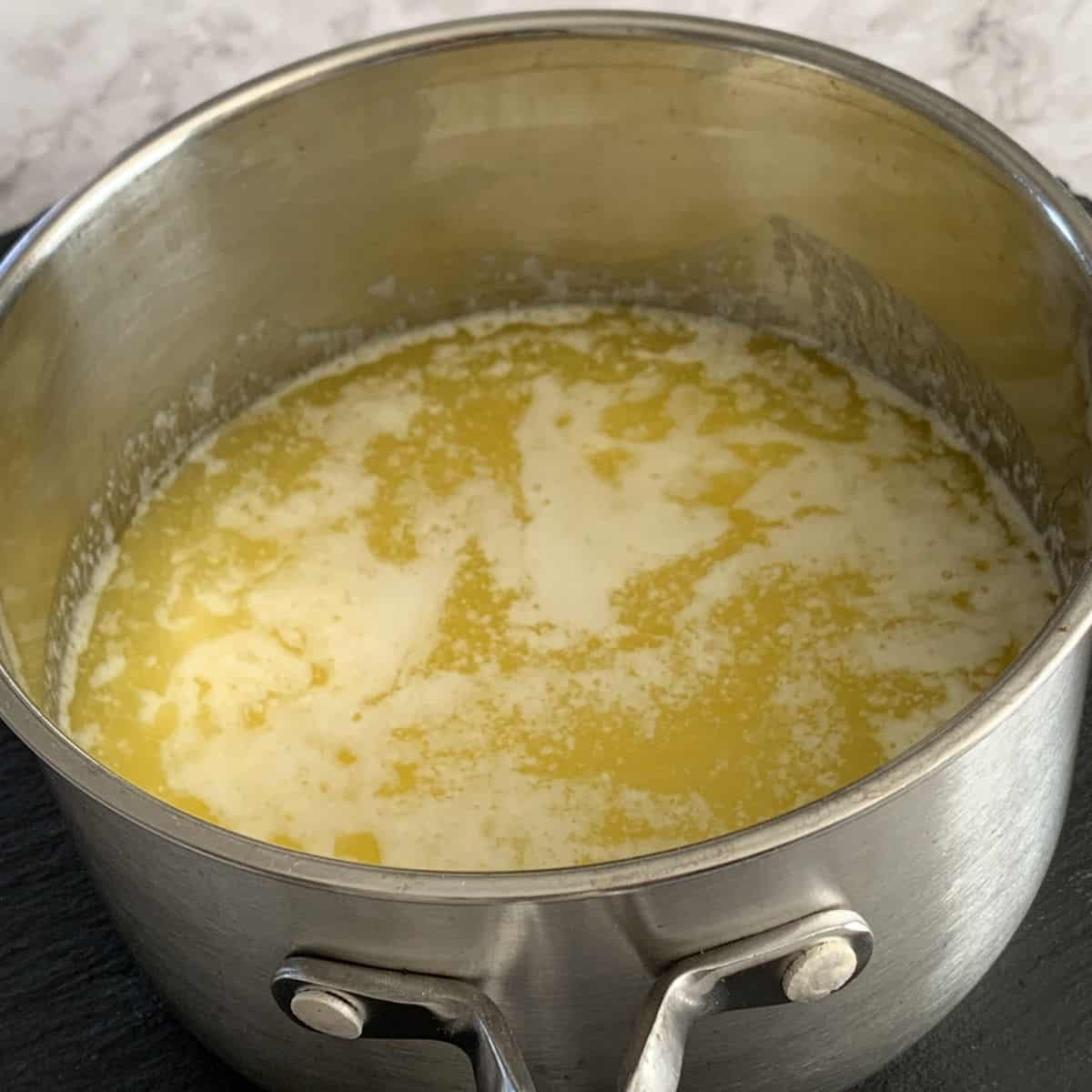 Melted butter in a pot.