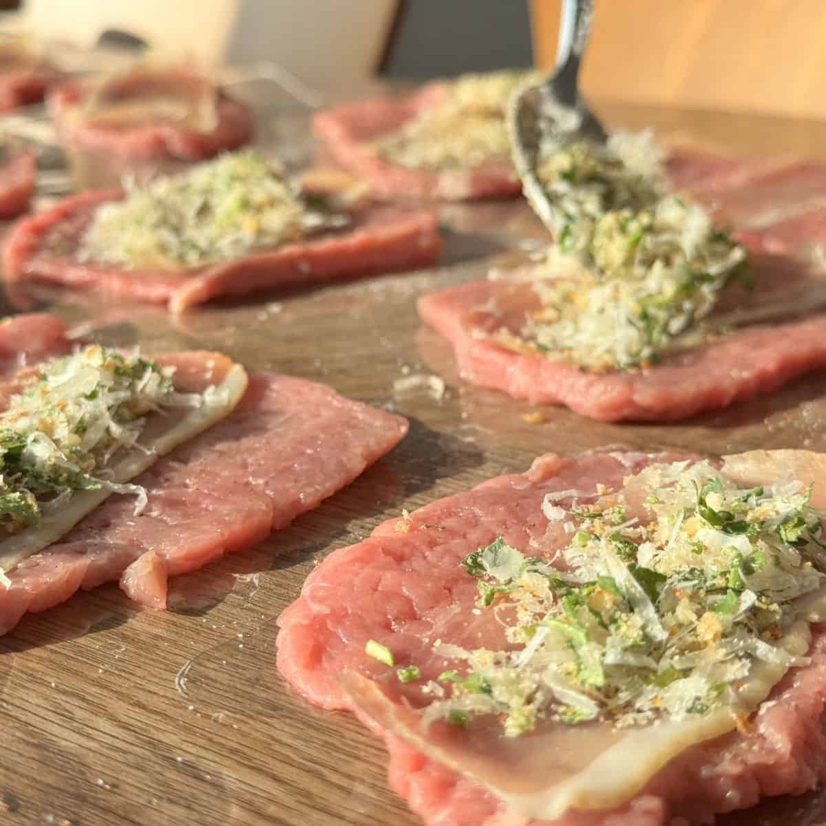 Process shots of making braciole, spoonful of stuffing.