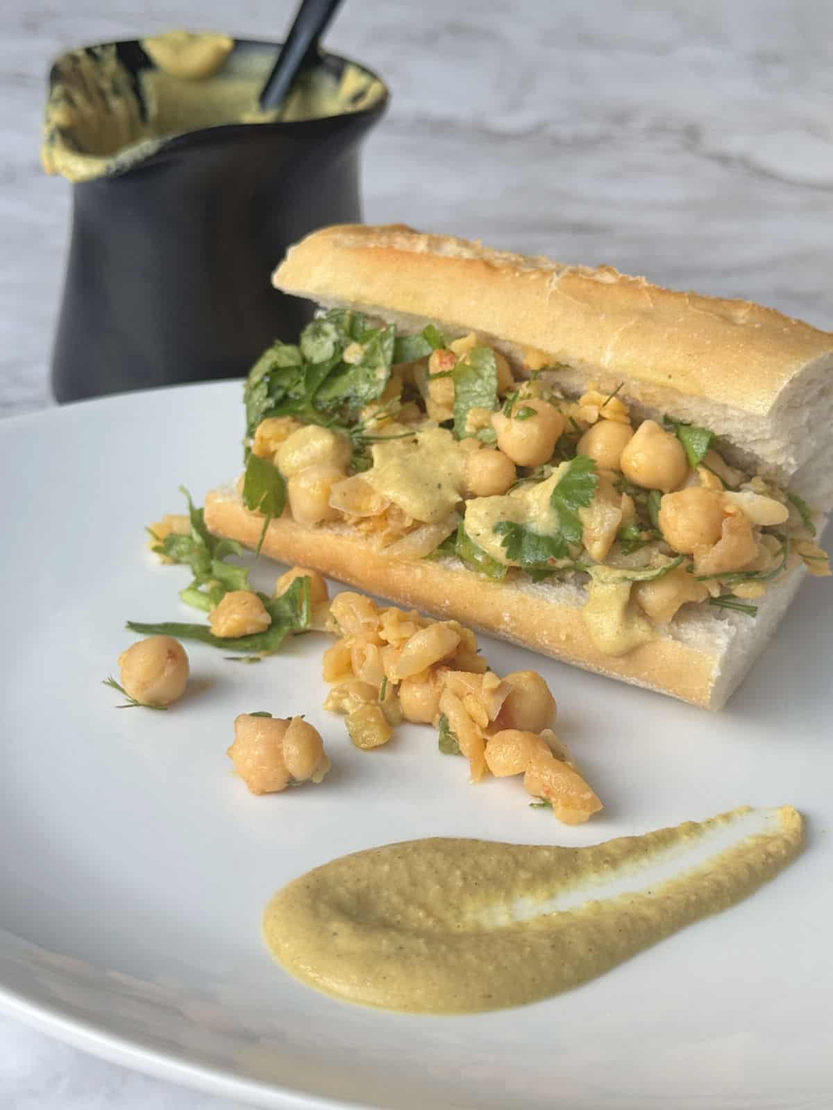Chickpea sandwich with spicy mustard.