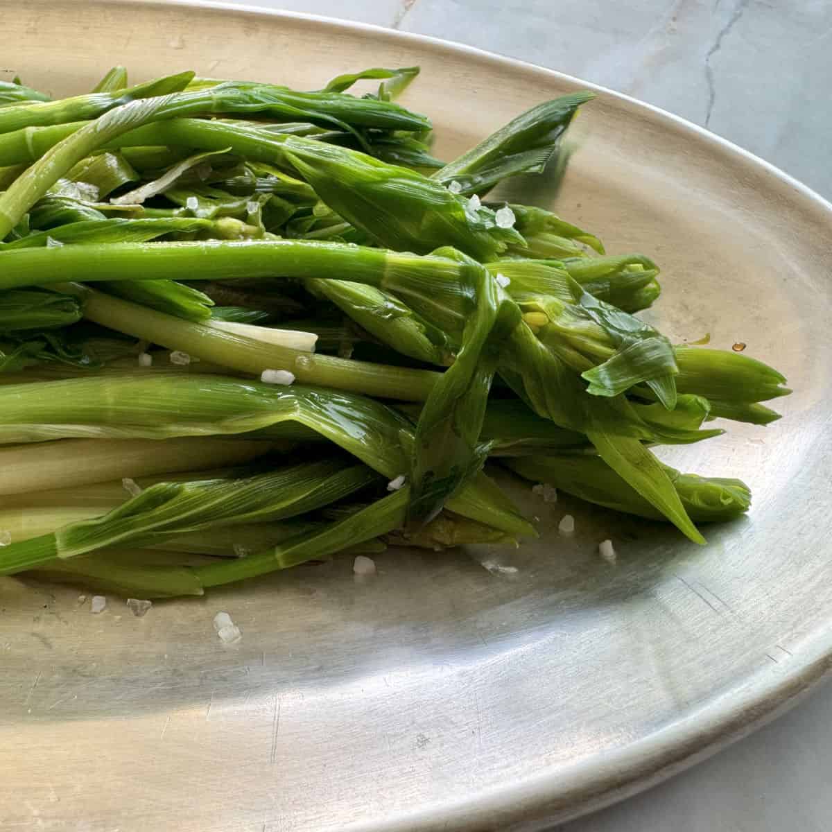 Solomon seal salad in a silver dish.