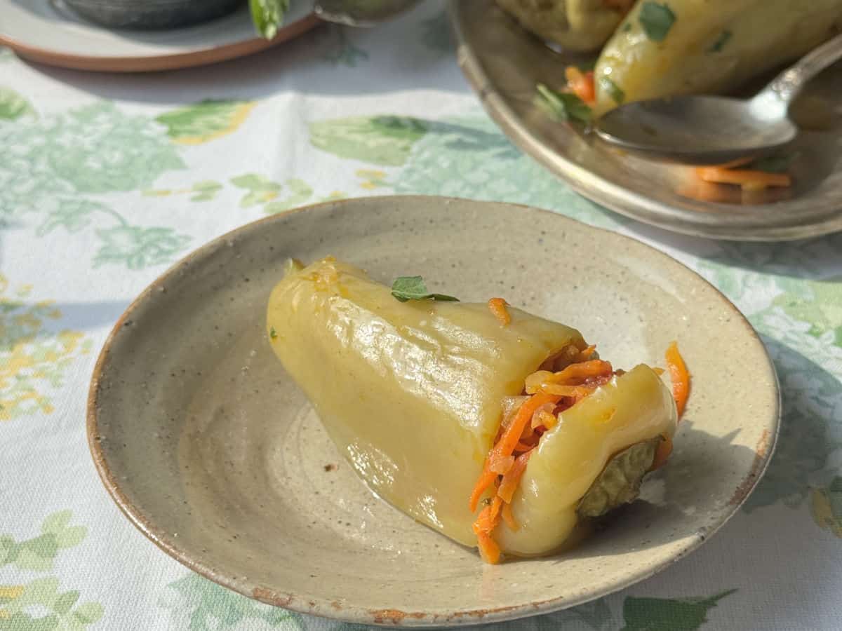 A close-up of a stuffed pepper showcasing its rich layers and textures.