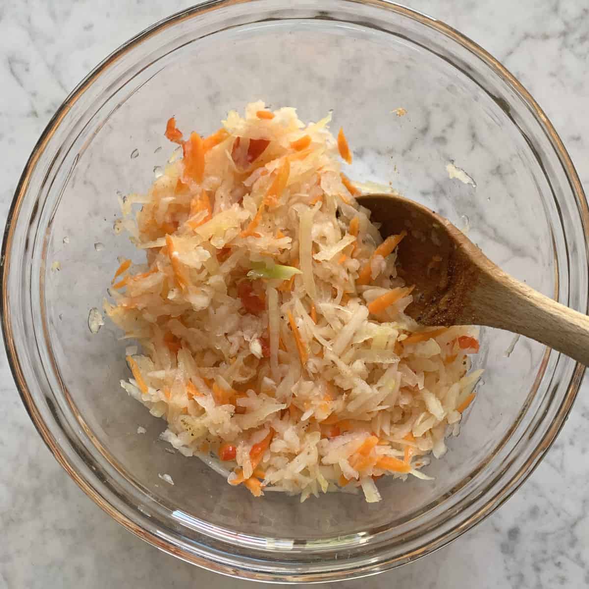 Shredded veggies in a bowl.