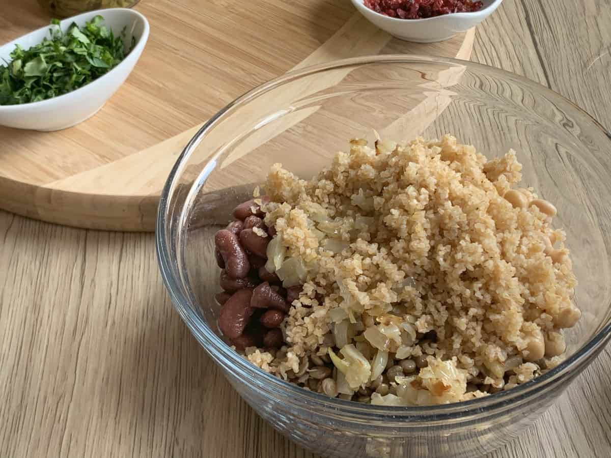 Onions and bulgur added to bean and lentil stuffing for tolma.