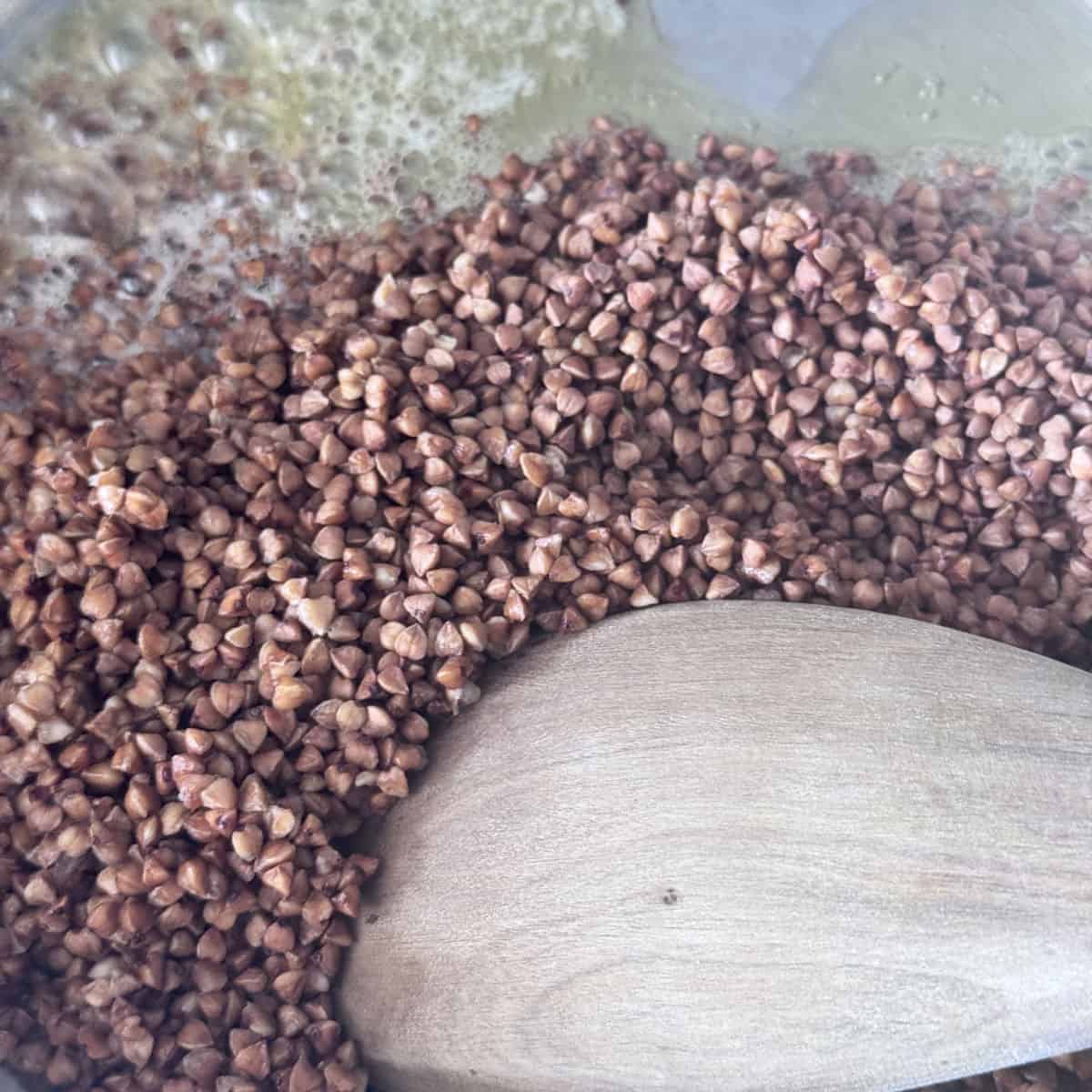 Toasting buckwheat pilaf.