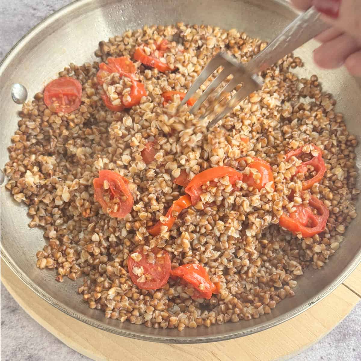 Fluffing the buckwheat pilaf